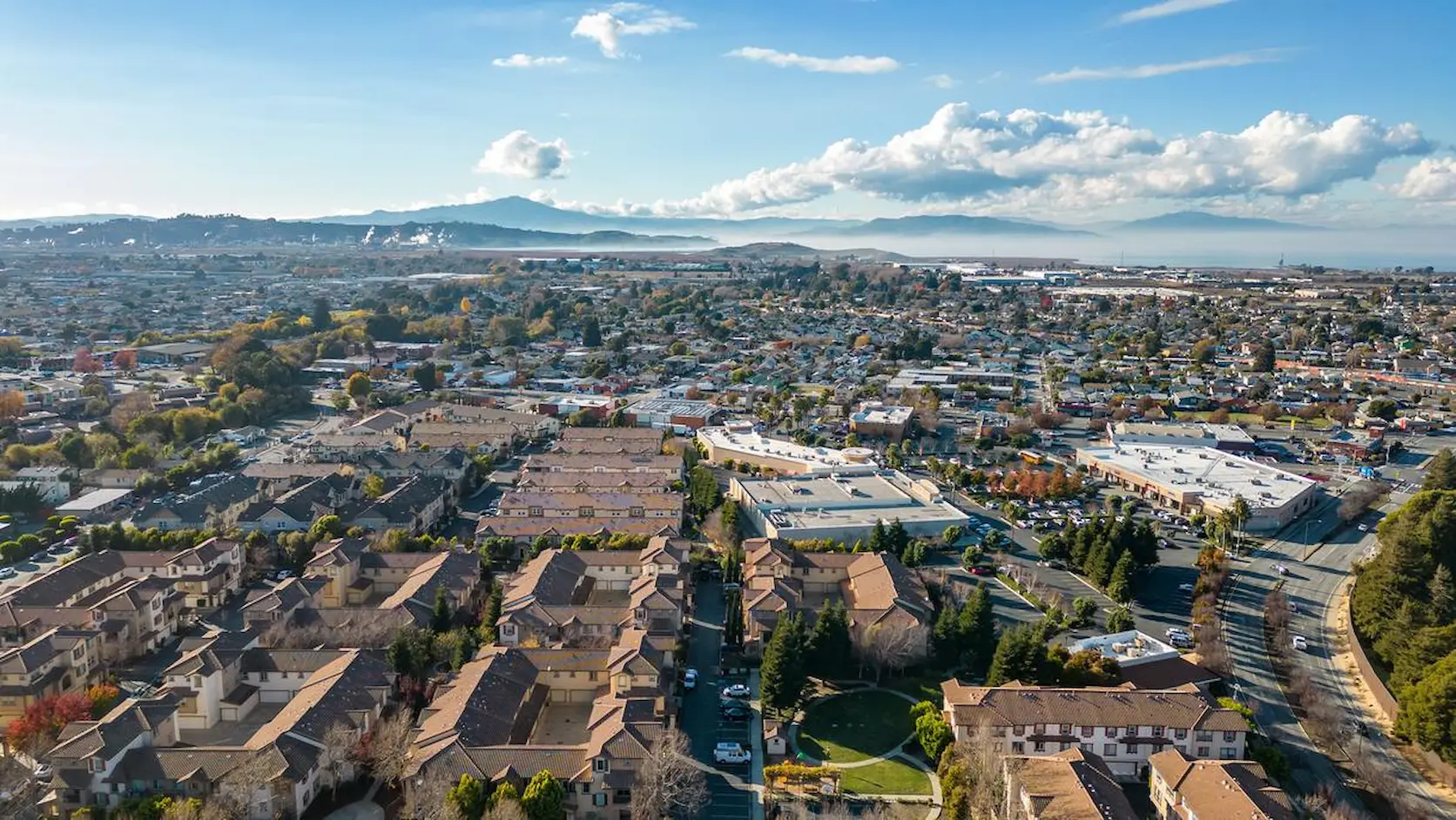 Aerial view of residential and commercial neighborhoods